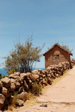 A Typical Tequile Island mud home on Lake Titicaca, Peruの写真素材