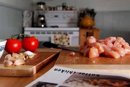 Preparing butter chicken, a traditional Indian dishの写真素材