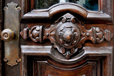 old dark brown wood brass doorknob