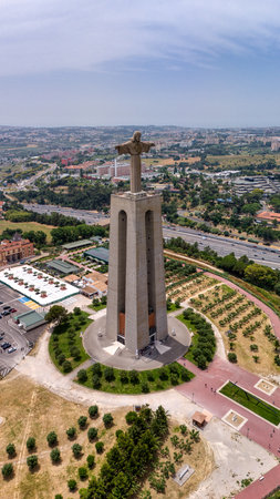 Standing tall above Almada, the Sanctuary of Christ the King offers breathtaking views of Lisbon and the Tagus Riverâa powerful symbol of faith, peace, and Portuguese resilience.の写真素材