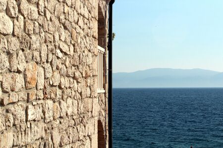 stone wall and adriatic seaの写真素材