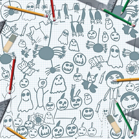 scribbles of halloween monsters on desk with pencils backgroundの写真素材