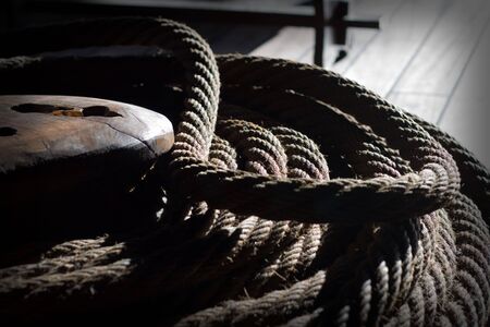 The rigging and rope details of a tall sailing ship at the scheepvaartmuseum (Maritime Museum) in Amsterdam.の写真素材
