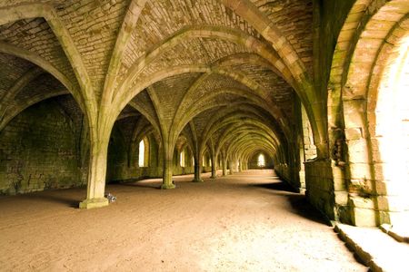 Vaulted ceilings in Fountains Abbey in North Yorkshire, shot with natural lighting from Tripod with 10-20mm lens.
Old broken down abbey and surounding grounds. Ancient Gothic archesの写真素材