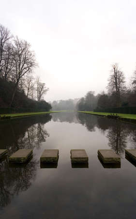 Stepping Stones at Fountains Abbey in North Yorkshire, old broken down abbey and surounding groundsの写真素材