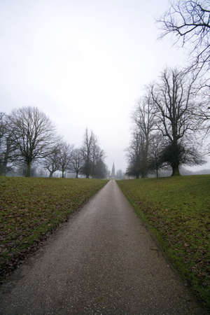 Views along a long road in Fountains Abbey in North Yorkshire, old broken down abbey and surounding...