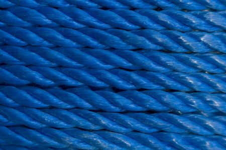 Coiled Blue Nylon Rope backgroundの写真素材