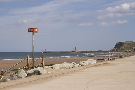 Steps sign on Sea front at Whitby, North Yorkshireの写真素材