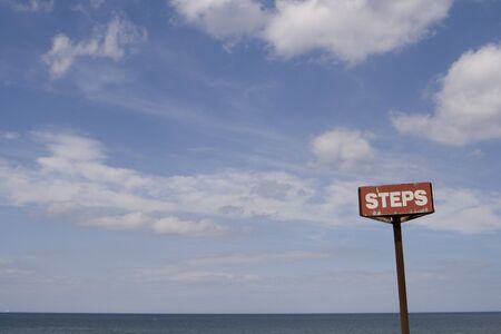 Steps sign on Sea front at Whitby, North Yorkshireの写真素材