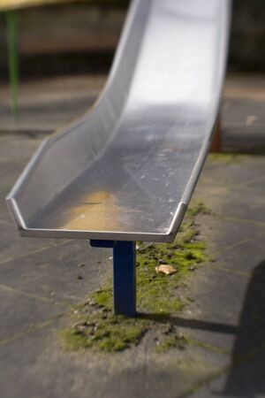 Lensbaby shot of childrens slide,  soft and distorted.の写真素材