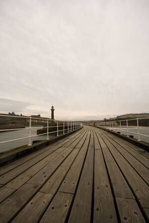 View of Whitby Harbour, overcast sky. Looking back at Whitby's Port.の写真素材