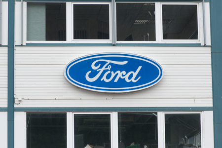 Andalsnes, NORWAY - CIRCA JUNE, 2016: Ford dealer sign at the entrance of the building. The Ford Motor Company is an American multinational automaker founded by Henry Ford in 1903.のeditorial素材