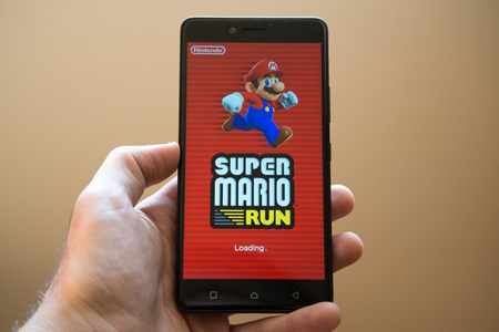 Nitra, Slovakia, March 20, 2017: Super Mario Run application logo on smartphone