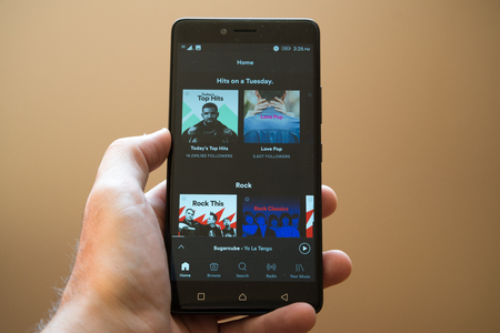 Nitra, Slovakia, March 20, 2017: Spotify application logo on smartphoneのeditorial素材