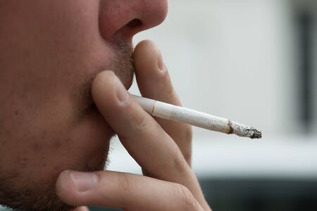 Man smoking cigaretteの写真素材