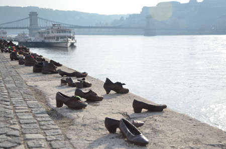 Budapest, Hungary: Shoes on the Danube Bank is a memorial to honor the people who were killed by fascist Arrow Cross militiamen in Budapest during World War IIのeditorial素材