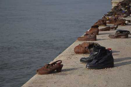 Budapest, Hungary: Shoes on the Danube Bank is a memorial to honor the people who were killed by fascist Arrow Cross militiamen in Budapest during World War IIのeditorial素材