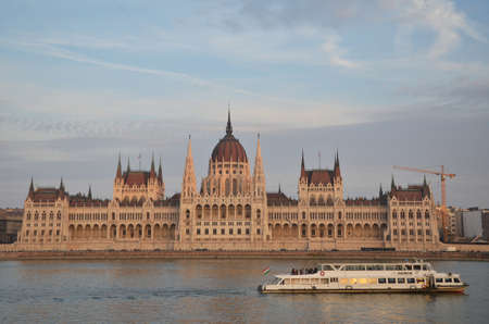 Sunset at Hungarian Parliament Building. It is the seat of the National Assembly of Hungary, a notable landmark of Hungary, and a popular tourist destination in Budapest.のeditorial素材