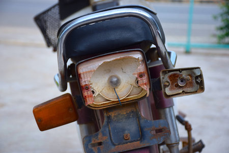 old motorcycle with broken tail light box and sign light boxの写真素材