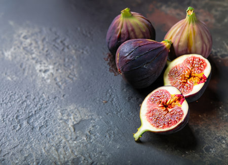 A few figs on an old cement background with copy space.の素材