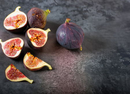 A few figs on an old cement background with copy space.の素材