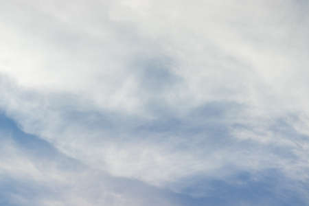 Blue sky and cotton cloudsの写真素材