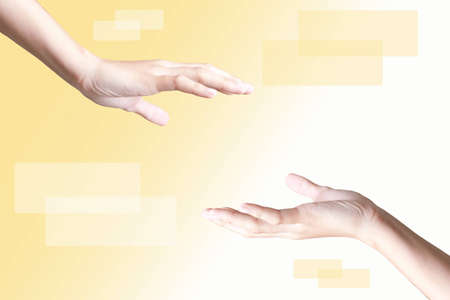one hand helping the other handの写真素材