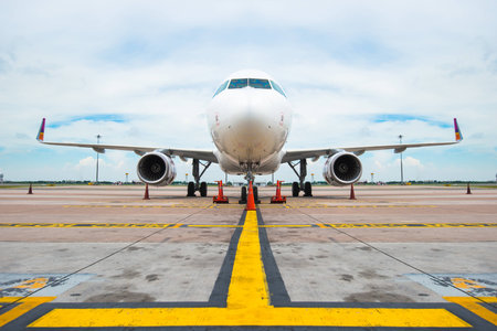 An airplane with blue sky for transportationの写真素材