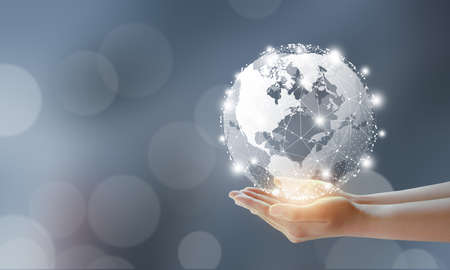 Businessman holding global technology and media digital network connection. Global Technology, Business, Media and Data Connection Concept.の写真素材
