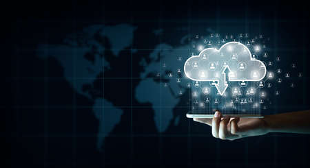 Businessman with Cloud computing technology internet storage network and smartphone. Connect mobile devices to cloud. Cloud technology and Cloud storage Concept.の写真素材