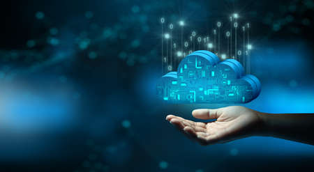 Businessman hand holding Cloud computing technology internet storage network. Cloud service, Cloud technology, and Cloud storage Concept.の写真素材