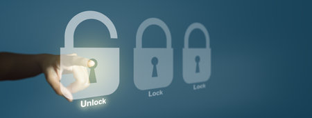 Businessman hand is unlocking security system. Online data security system and network cyber security technology. Cybersecurity, managed services, identity, information privacy Concept.の写真素材