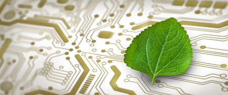 Green leaf on the converging point of computer circuit board. Nature with Digital Convergence and Technological Convergence. Green Computing, Green Technology, Green IT, csr, and IT ethics Concept.の写真素材