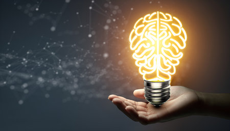 Businessman holding Light bulbs with Brain inside and Low poly wireframe outside. Creative and...