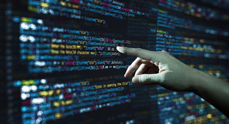 Human hand pointing at the abstract Modern tech of Programming code screen developer. C Programming...