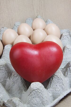 Heart and eggs on paper panel and paper pattern woodの写真素材