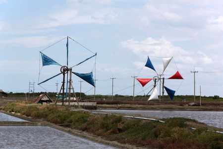 Wind Turbine for pumping sea water. For the production of salt, using sunlight. Thailand.