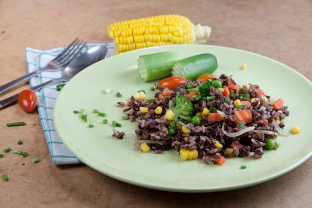 Thai Fried Rice Benjarong in green dishの写真素材