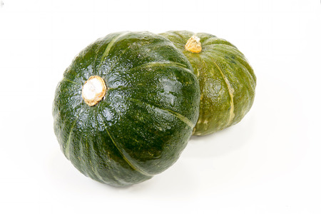 Fresh Green Japanese Pumpkin on isolated white background with clipping pathsの写真素材