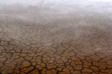 The soil dried had under the flooded. Under water see through of Drought still see traces
