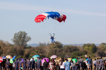PRACHUAPKIRIKHAN, THAILAND - JAN 14 2017: Skydiver show from Air Force after Parachutist performs sports parachute jump on children's dayのeditorial素材