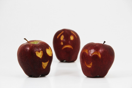 Love triangle of an apple broken heart from two apples love each otherの写真素材