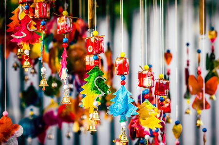 Handmade paper cut Christmas tree and golden bells on wall background  (handmade, christmas tree, xmas )の写真素材