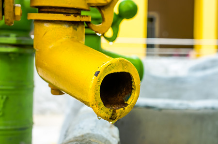 Close up of water pump. Outdoor (water, pump, tube)の写真素材