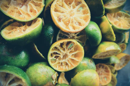 Sliced green oranges. Mood effect process pictures fruit orange juicyの写真素材