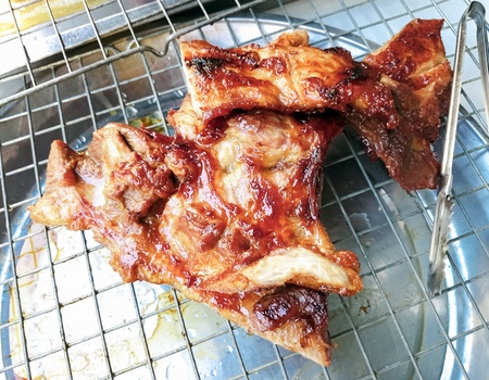 Roasted Pork on Steel Grating asian roasted porkの写真素材