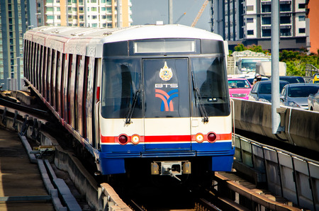 A BTS Sky train at a saphan taksin station on July 14, 2015 in Bangkok, Thailand.  Saphan Taksin station is a BTS sky train station, on the Silom Line in Sathon Districtのeditorial素材