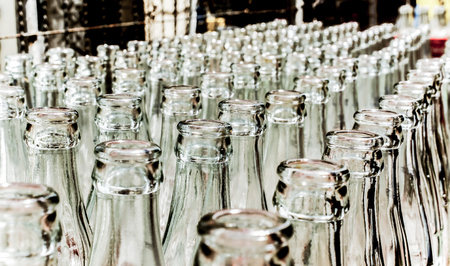 Close up detail of used glass bottles. Soft and selective focusの写真素材