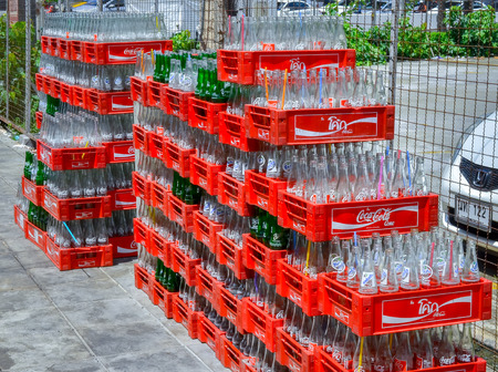 Empty bottles of Coca Cola for recycle on July 28, 2015 in Bangkok, Thailand. Coca Cola drinks are produced and manufactured by The Coca-Cola Companyのeditorial素材