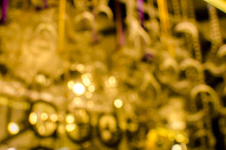 Defocused blurred gold color abstract texture background for your designの写真素材